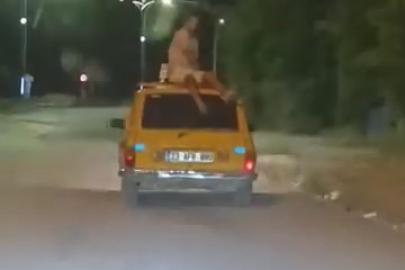 Aracın tavanında tehlikeli yolculuk