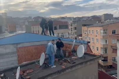 Aranan şüpheli kaçmaya çalışırken çatıda böyle yakalandı